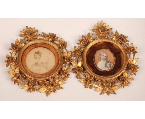 A pair of fine 19th century carved gilt miniature frames. One with an oval miniature of a child holding a kitten 5.8 x 5 cm, 