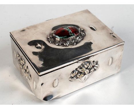 An Arts and Crafts silver plated box by K. Mottl, the lid with oval enamel sides embossed with fruit baskets, width 14cm. Con