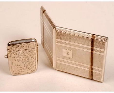 A silver vesta case converted to a lighter, engraved with ivy leaves and the words 'Peter from Mother', Birmingham, 1908, tog