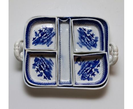 An early nineteenth century Coalport blue and white transfer printed pickle set, circa 1800-10. Each piece is decorated with 