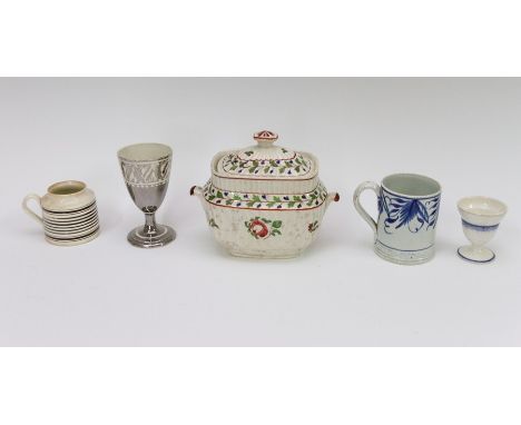 A group of early nineteenth century hand painted pearlware pieces, circa 1810-25. Included: a blue hand-painted small tankard