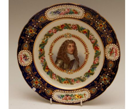 A mid-nineteenth century Sevres-style shaped circular porcelain plate, decorated with a portrait panel of G. Corde, within gi