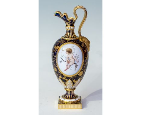 A Mintons hand painted ewer, early 20th Century, with foliage decoration on a blue ground, with a signed panel of a child sit