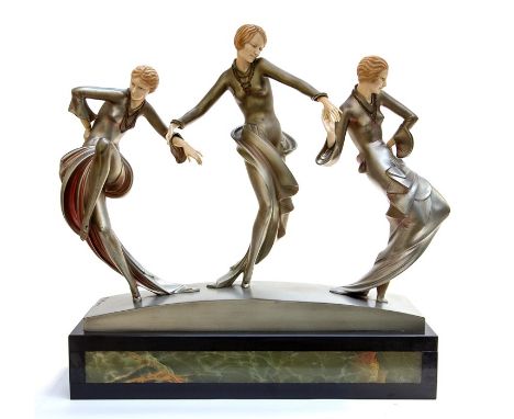 Paul Philippe (French, 1870-1930), an Art Deco chryselephantine (cold painted bronze and ivory) figure group of three jazz da