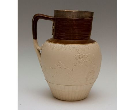 A large early nineteenth century saltglazed stoneware Turner jug with hallmarked silver rim, circa 1800. It is decorated with