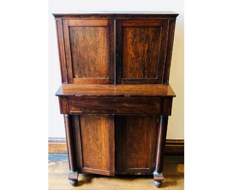 A George IV rosewood chiffonier secretaire, circa 1829, moulded dentil pediment above two panel cupboard doors with brass loc