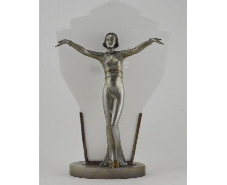 A 1930's Art Deco cold painted spelter table lamp, as a fashionable lady with arms outstretched, acetate shade, on an alabast