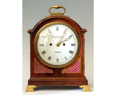 Wales & McCulloch, London, a mid 19th Century mahogany bracket clock, circa 1845. the arched case with brass swing handle, 19