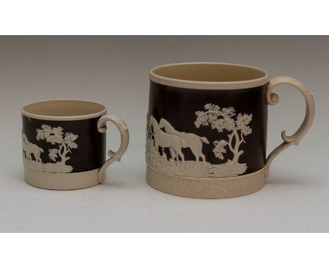 Two early nineteenth century Chetham and Woolley feldspathic stoneware tankards, circa 1810-20. Both decorated with the same 