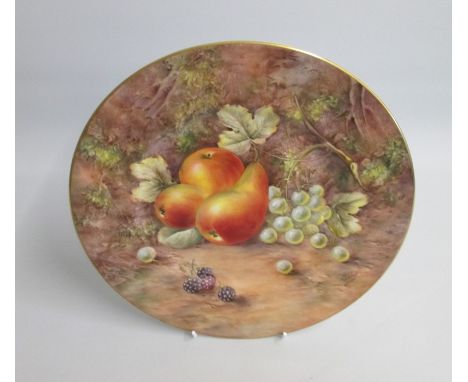 A Royal Worcester Plate Painted with Fruit signed by P. Love.Date: 20th century  Black markSize: 27cm diameterCondition: Some