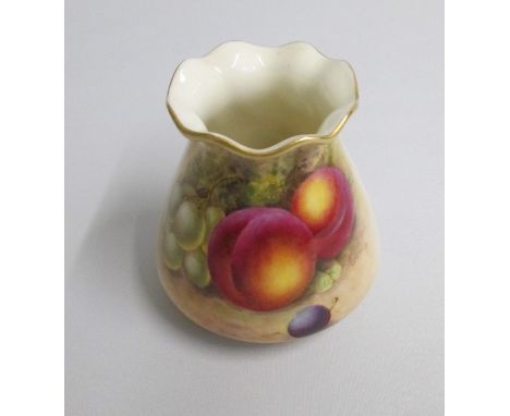 A Royal Worcester Vase, painted with fruit.Signed by Freeman  Shape G957Date: code 1939 puce markSize: 9cm highIn good condit