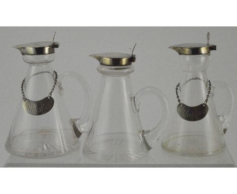 Three conical glass whisky noggins, all silver mounted, two with Whisky tickets, one marked Asprey, with collection of assort