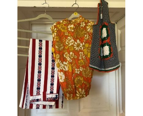 A circa 1960's crochet tank top with crochet colourful panel and an orange patterned short top, high neck; trousers "I'm Back