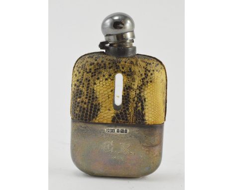 A late Victorian silver mounted glass hip flask, simulated reptile skin cover, maker Dixons, Sheffield 1899, monogram and dat