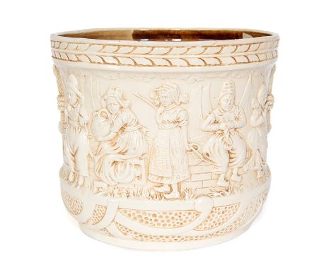 A Bretby Art Pottery moulded ivory ground jardiniere with scenic decoration of Dutch children. No. 3410, 27 cm tall. (1)Condi