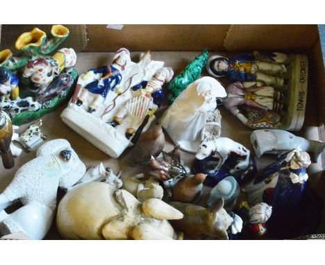 A collection of assorted figures, including a Royal Worcester figure of Queen Elizabeth II commemorating the golden jubilee 2