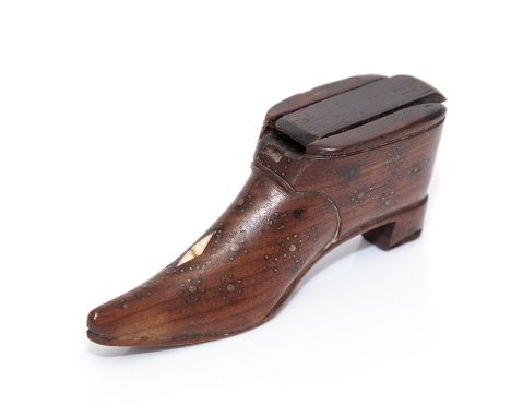 A mid 19th Century treen shoe snuff box, inlaid ivory lozenge and brass tack, sliding cover, width 8cm