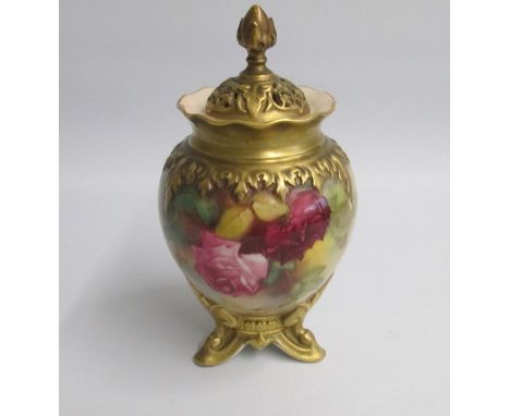 A Royal Worcester Vase and Cover standing on three Gilt feet and painted with RosesUn-signed   Shape 245HDate: code 1922  Puc