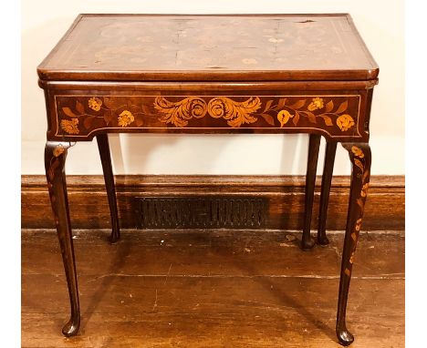An 18th century Dutch mahogany and marquetry fold over gateleg card table, rectangular hinged top with a moulded edge, marque