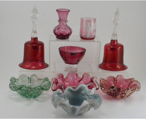 A pair of Victorian ruby glass bells (no gongs), a Mary Gregory glass beaker, a Victorian ruby glass flared bowl, a ruby glas