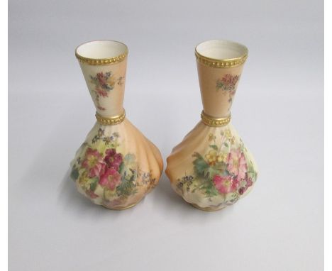 A Pair of Royal Worcester Blush Ivory Wrythen Moulded Vases  painted with flowers. Shape 1158Date: coded 1918  Puce markSize: