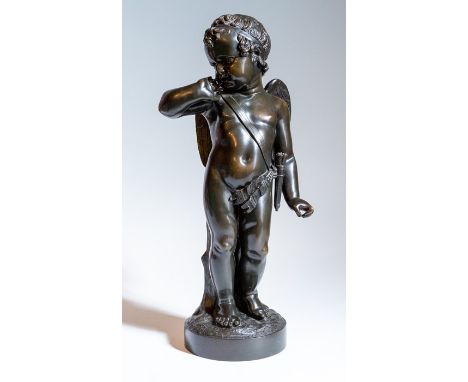 A bronze figure of a male cherub, 47cm high