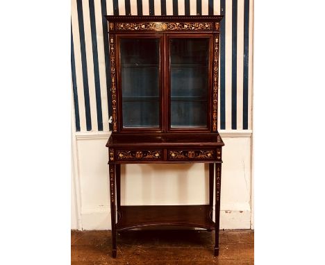 A late Victorian mahogany inlaid display cabinet on stand, circa 1900, dental pediment above a two panel glazed doors with gl