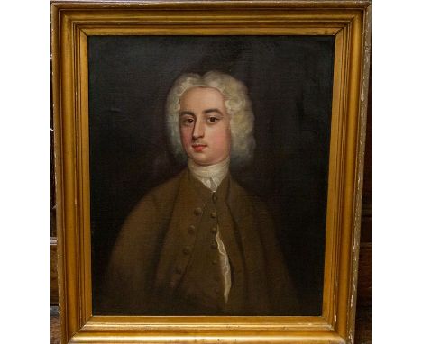 Circle of Enoch Seeman, mid 18th Century, portrait of a young gentleman, half length in a brown coat and waistcoat, on canvas