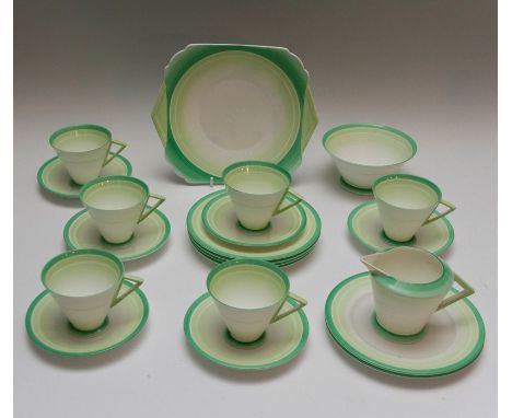 A Shelley Art Deco Eve tea service, concentric green circles design, No.411959, comprising cake plate, cream jug, sugar bowl,