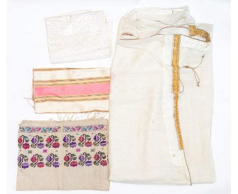 A Syrian jalabiya edged in woven gold braid, 1920s and a part tunic with embroidered parts (some wear). A southwest Turkey c.