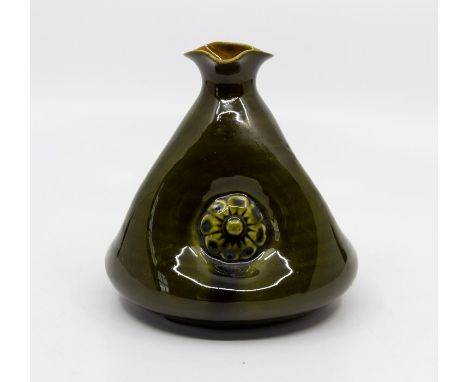 Christopher Dresser for Linthorpe Art Pottery, a conical and dimpled olive glaze vase, No. 57 with impressed Christopher Dres