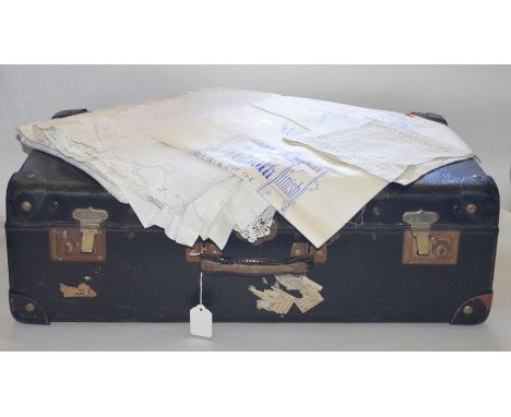 A collection of linen to include a piece of fabric printed by engraved roller, blue on white c.1900 all in a vintage case wit