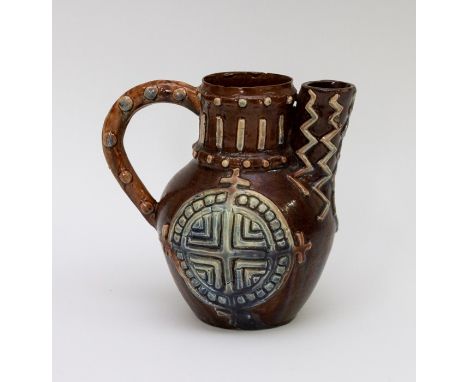 A late nineteenth century Castle Hedingham Pottery Art Pottery handle jug/teapot, circa 1880. It has applied geometric decora