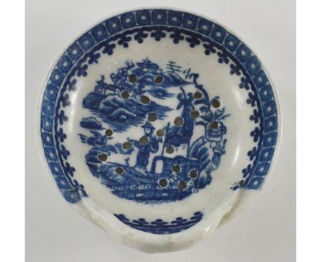 A late eighteenth century blue and white transfer printed porcelain Caughley Milsey or Egg Drainer, circa 1790. It is decorat