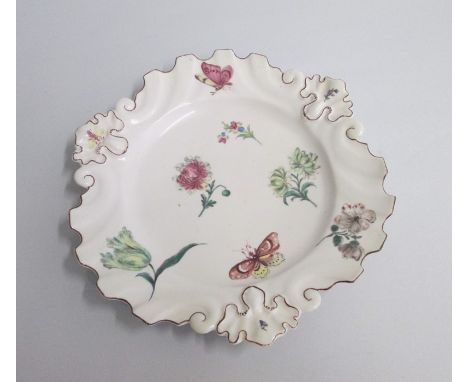 A Chelsea Silver Shaped Polychrome Plate painted with flower sprays and butterflies.Date: circa 1755-56  Red anchor markSize: