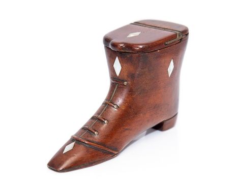 A mid 19th Century treen table shoe snuff box, carved laces, inlaid mother of pear lozenges and brass tack, width 10cm