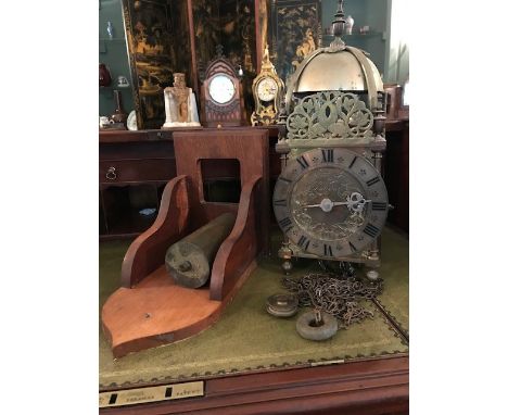 William Gray, a 20th Century brass lantern bracket clock, with a wooden wall bracket and cylinder weight (left hand-side door