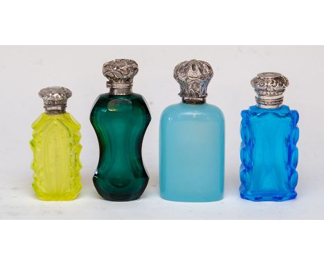 Four 19th Century coloured glass scent bottles, to include one uranium yellow, one opaque blue, one green and one electric bl