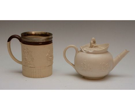 An early nineteenth century saltglazed stoneware Turner tankard with hallmarked silver rim, circa 1800. It is decorated with 