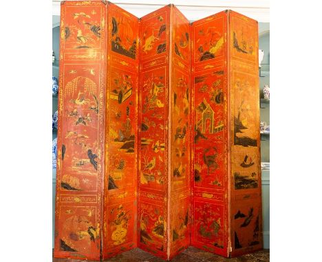 An 18th Century European six panel room divider screen, extensively decorated in gilt with chinoiserie devices including land