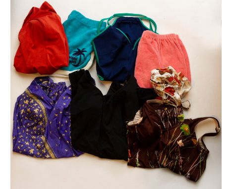 A collection of swimsuits to include a deep peach backless nylon 1970s/80s. A brown floral design swimsuit in a colour way of