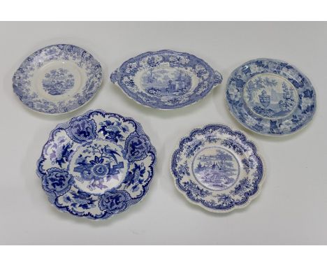 A collection of early nineteenth century blue and white transfer printed wares, circa 1815-25. Included: Three Spode Trophies