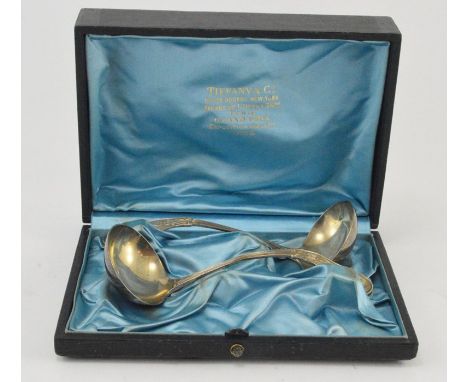 Tiffany &amp; Co, a cased pair of late 19th Century Tiffany &amp; Co sterling silver ladles, Aesthetic Movement Japanesque de