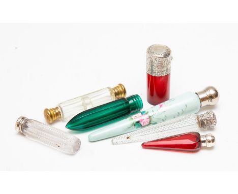 A collection of seven assorted Victorian scent bottles, to include ruby glass, clear cut glass and a ceramic teardrop shaped 
