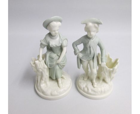 A pair of Rare Royal Worcester Celadon and white Figures  of a Gallant and companion by Charles Toft.Date: code 1882Size: 16.