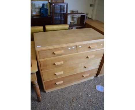 IN THE STYLE OF HEALS, MID CENTURY LIGHT OAK FIVE DRAWER CHEST WITH CUP HANDLES, 107CM WIDE
