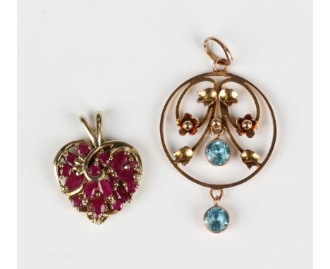 An Edwardian gold and pale blue gem set pendant of circular openwork design with floral motifs, detailed '9ct', length 3.8cm,
