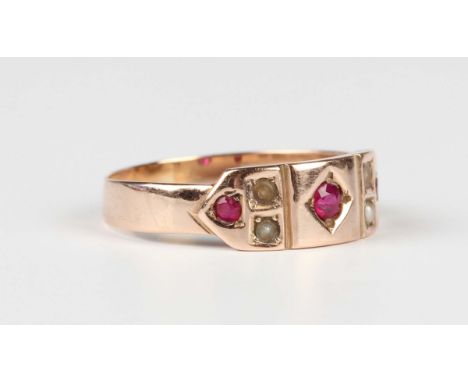 A late Victorian 9ct gold, ruby, garnet and half-pearl ring, mounted with the principal ruby to the centre, Birmingham 1896, 