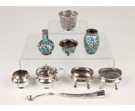 A small group of Chinese silver, comprising a mustard and matching salt of lobed circular form, a pair of oval salts on scrol