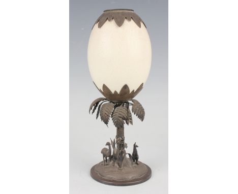 A late 19th century New Zealand silver mounted egg cup by B. Petersen &amp; Co, the cream coloured egg (possibly from a great